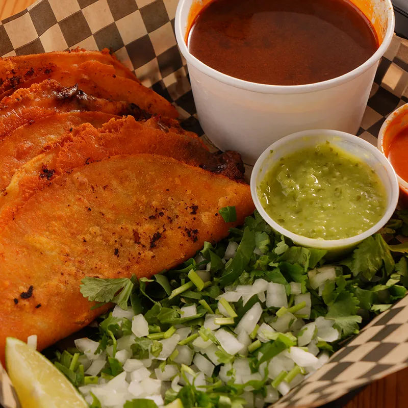 An image of the Youtube logo on a white phone